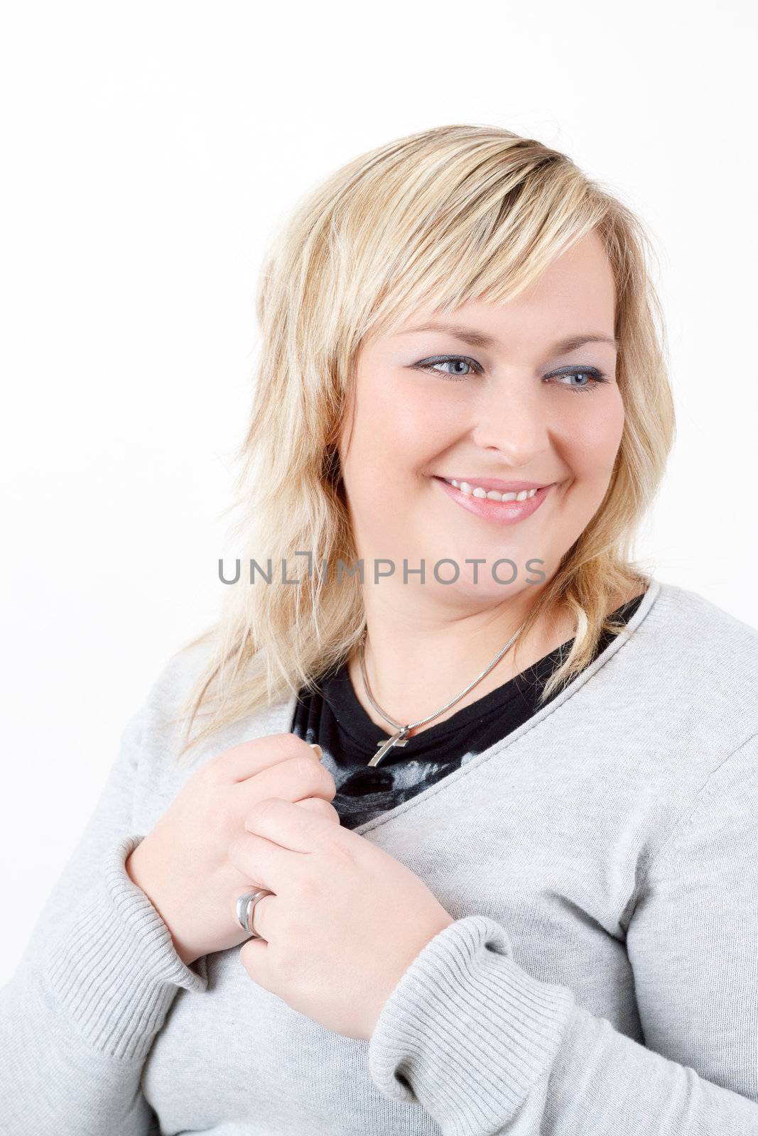 Portrait of cute smiling relaxing plump woman