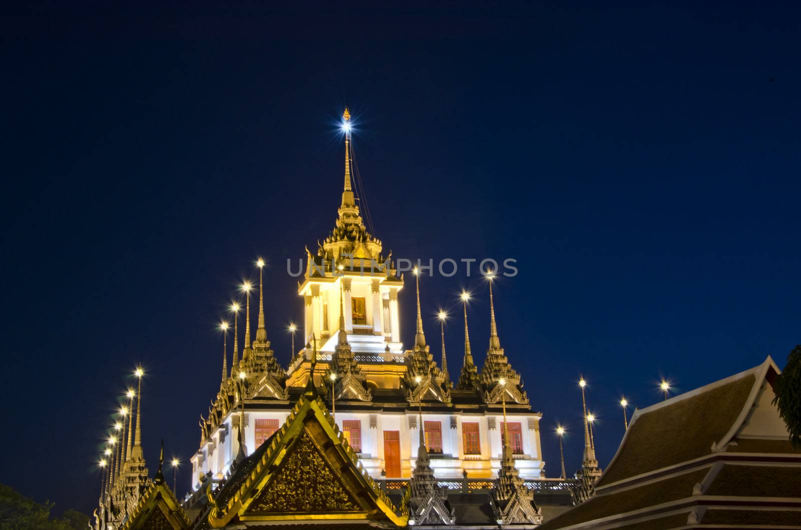 Twilight at Wat Ratchanatdaram Worawihan Temple, beautiful temple view to skyline in Bangkok, Thailand 