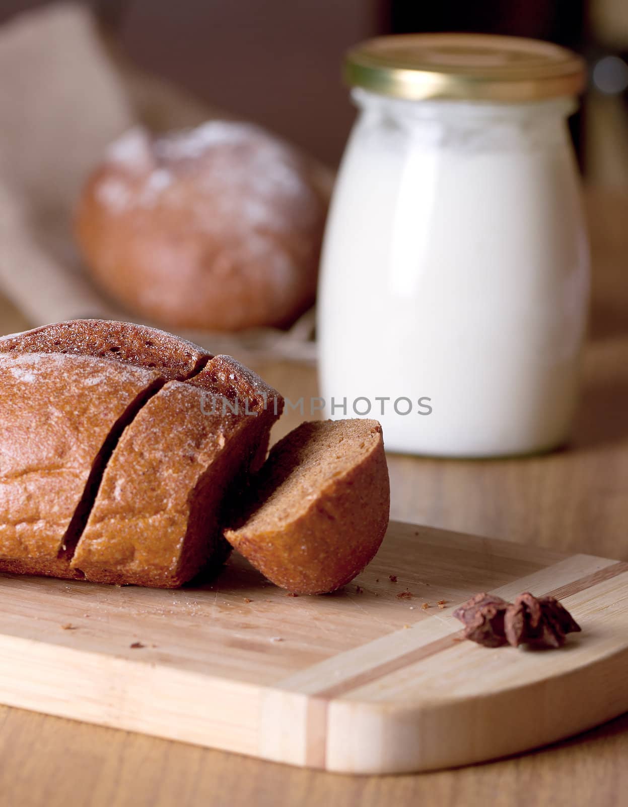 Baking cake and milk on background