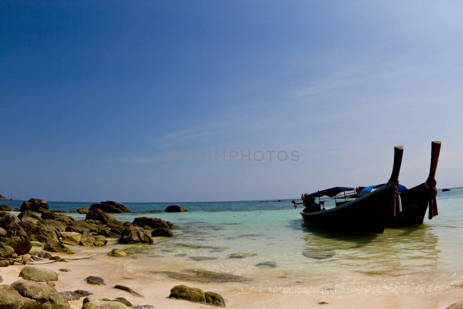 Summer on an isolated beach in Thailand.
