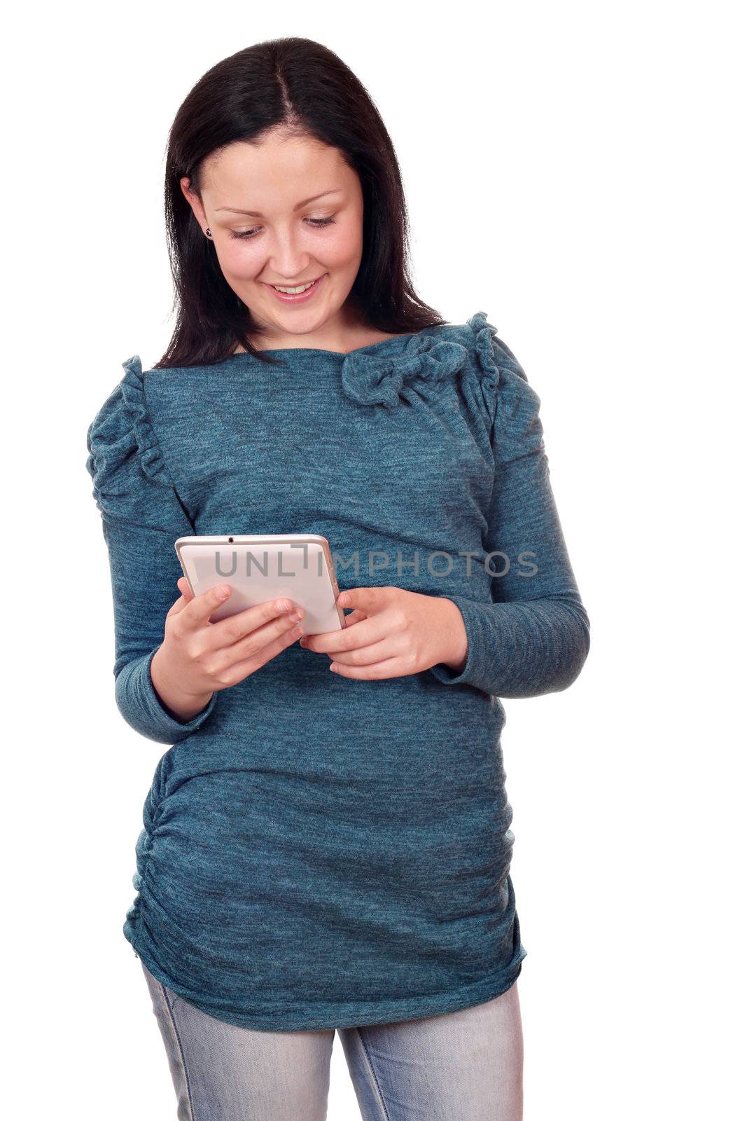 beautiful teenage girl play with tablet pc by goce