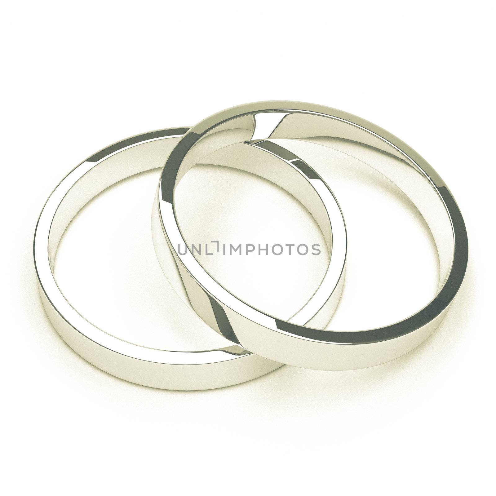 A pair of isolated silver or platinum weddings rings.