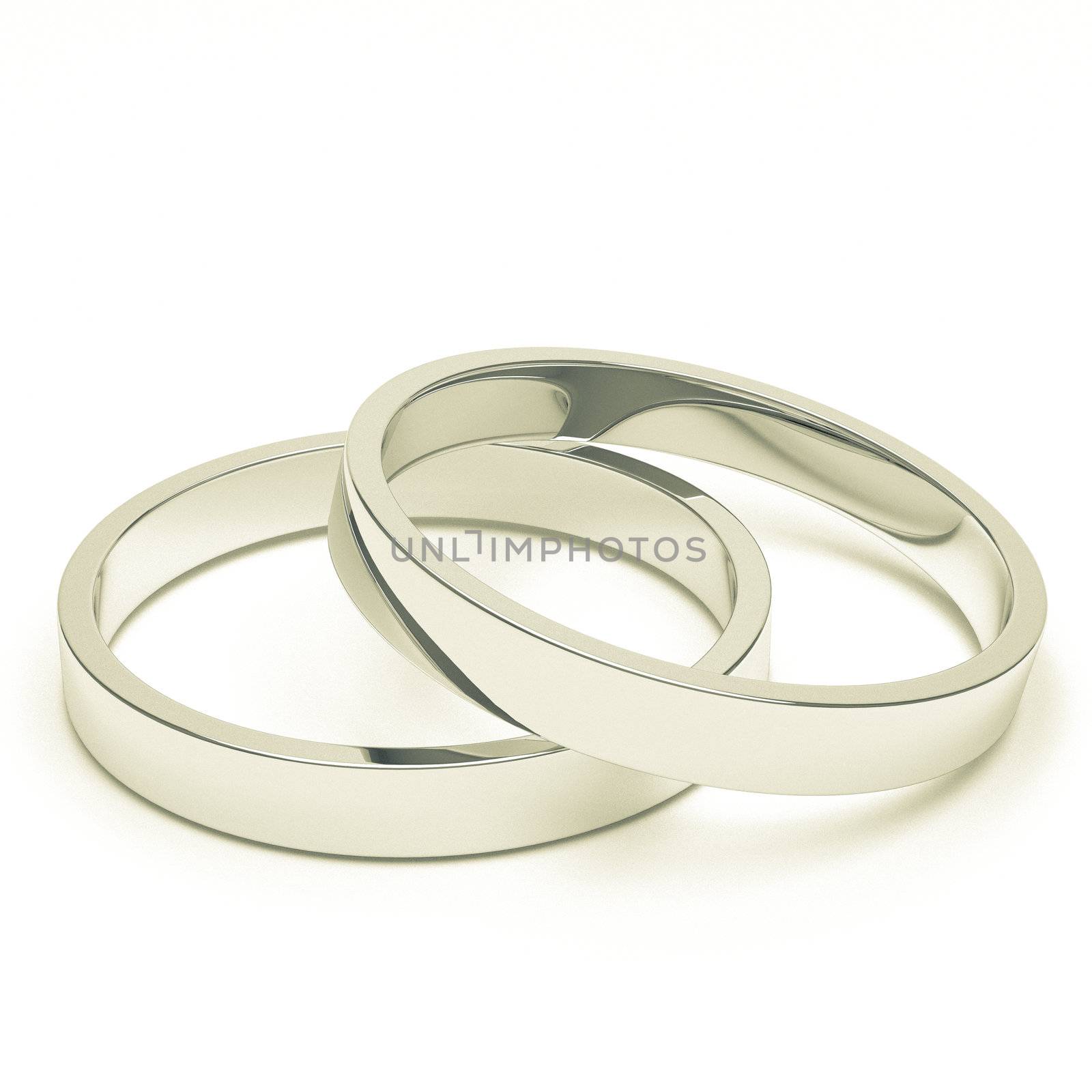 A pair of isolated silver or platinum weddings rings.