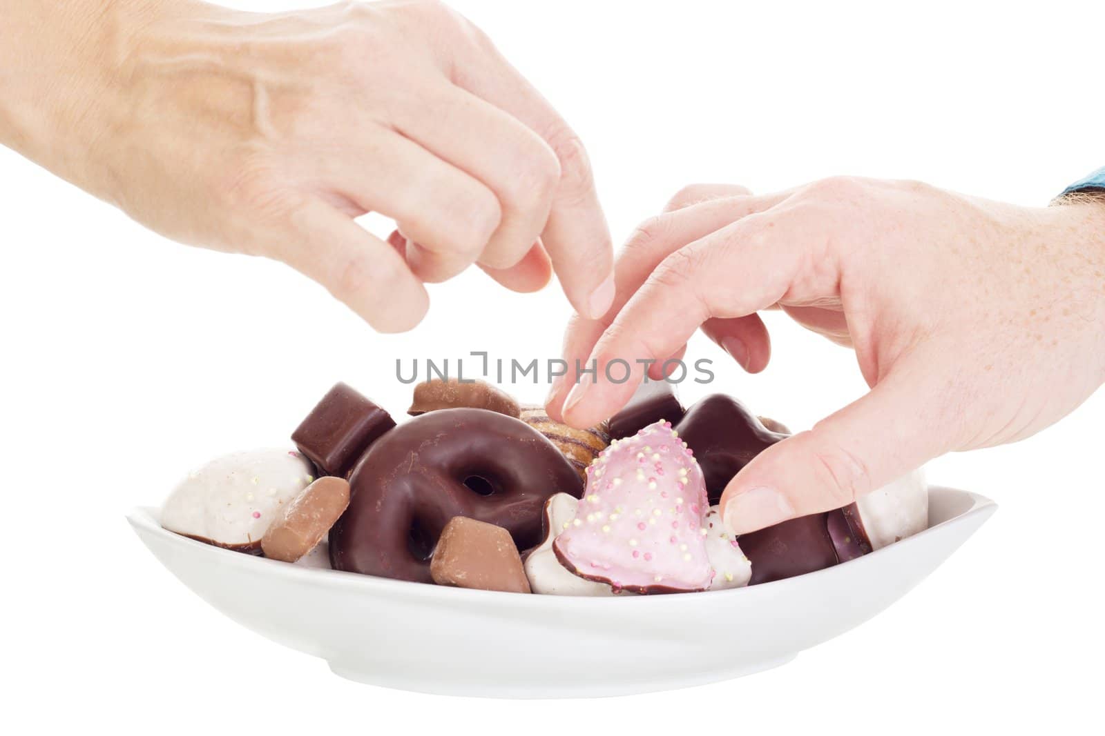 People eating some delicate gingerbreads