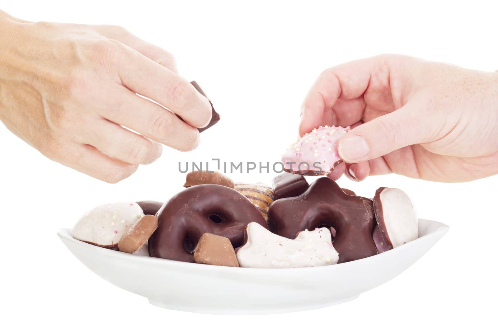 People eating some delicate gingerbreads