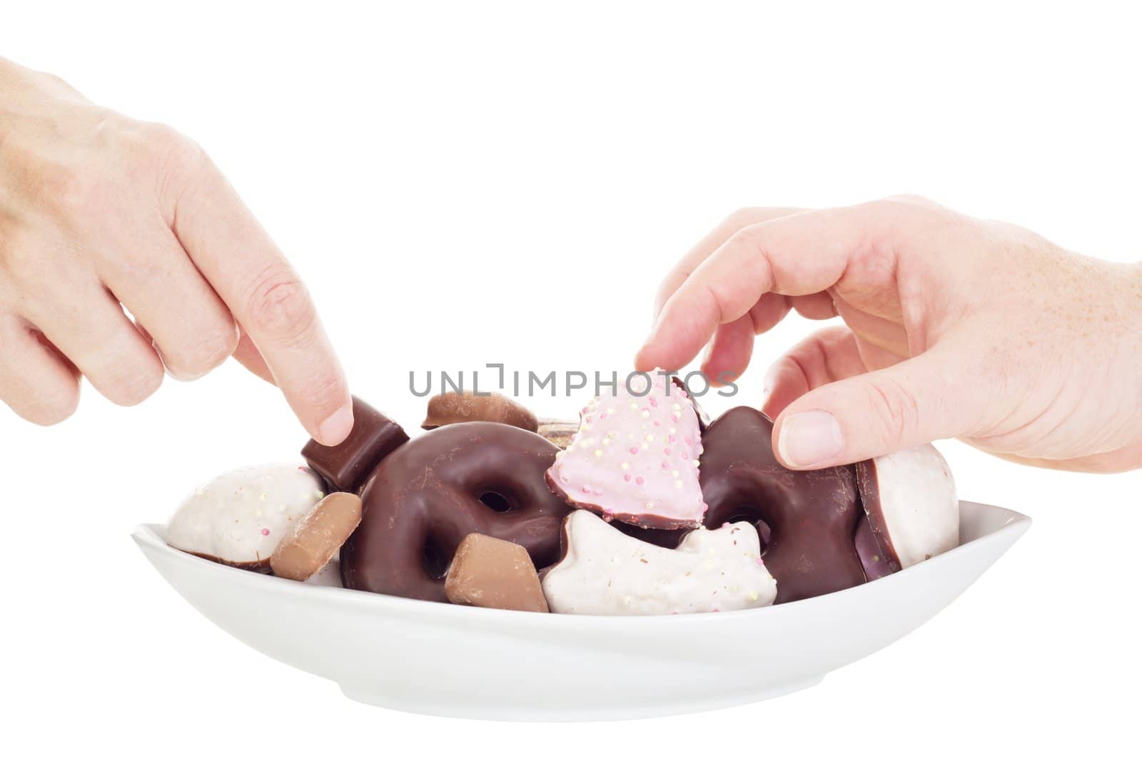 People eating some delicate gingerbreads