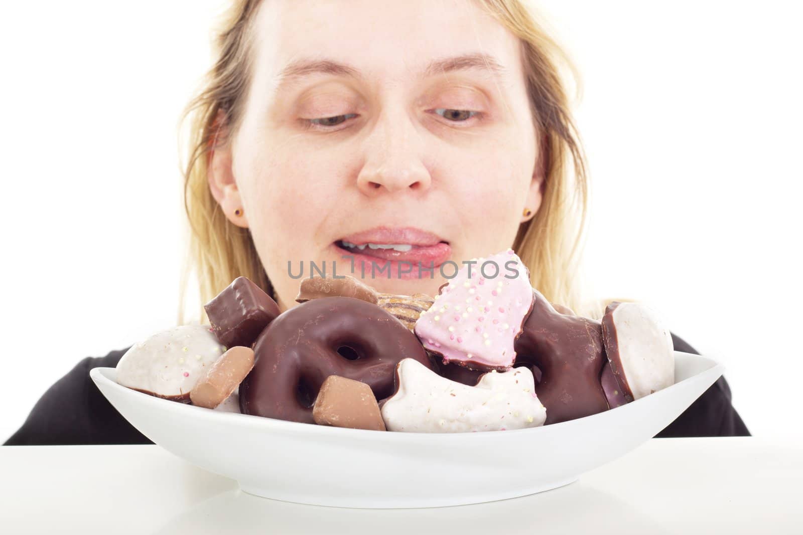 Person eating some delicate gingerbreads