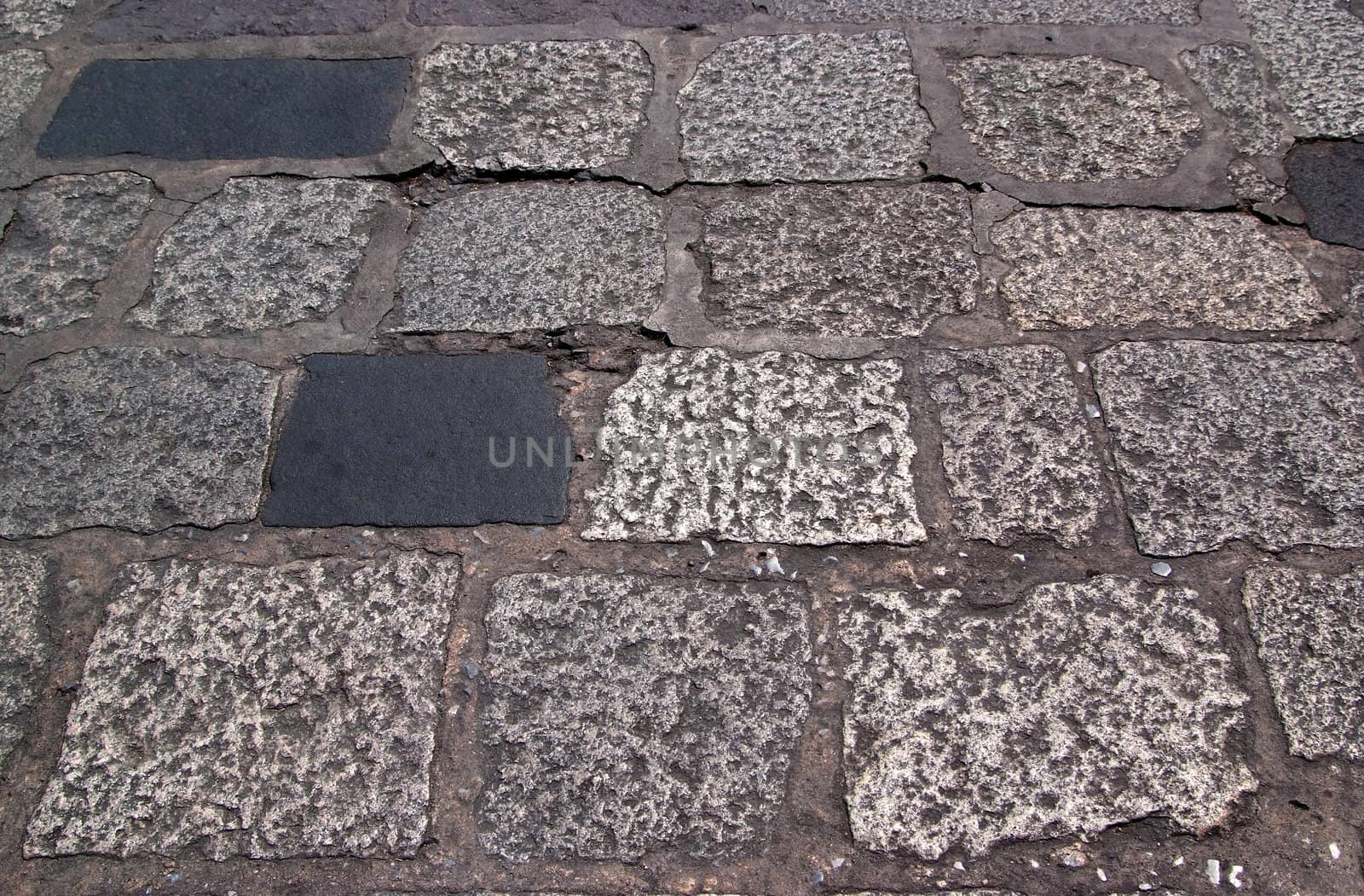 Old road paved with the cobble stones