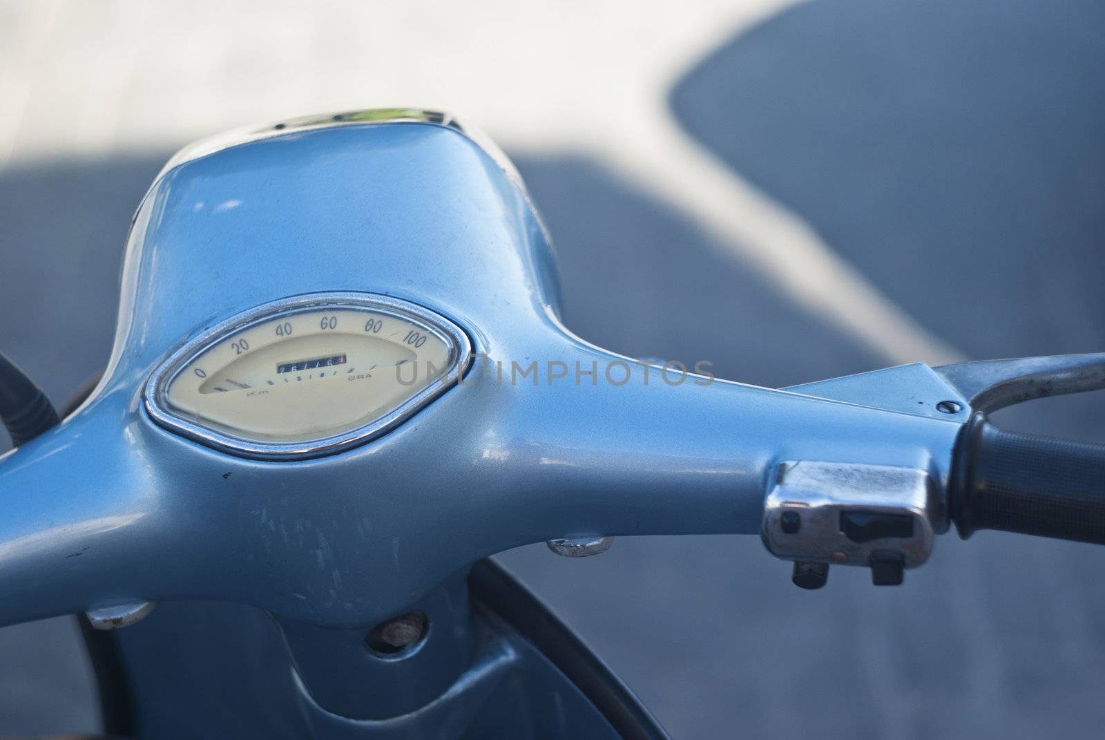 detail of the handlebar of an old Italian scooter