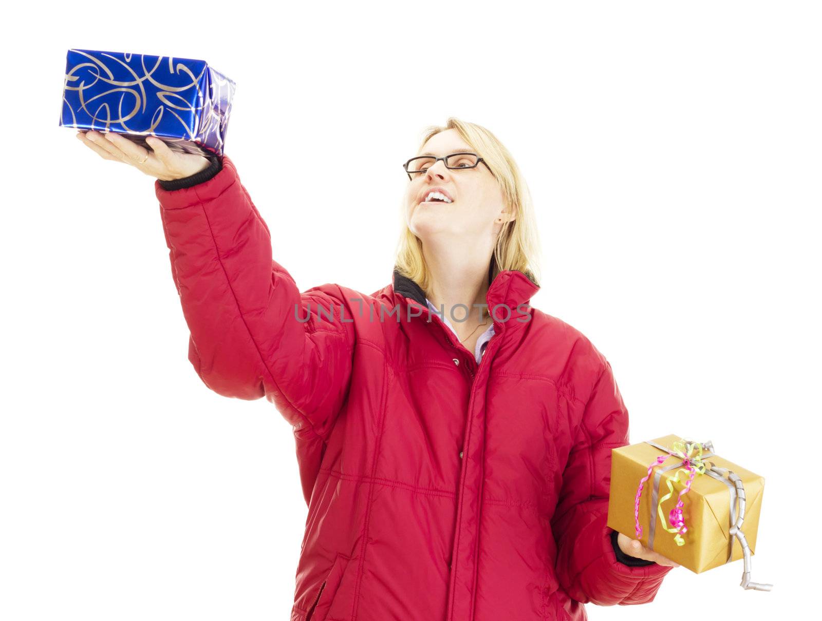 A female person juggling with two colorful gifts