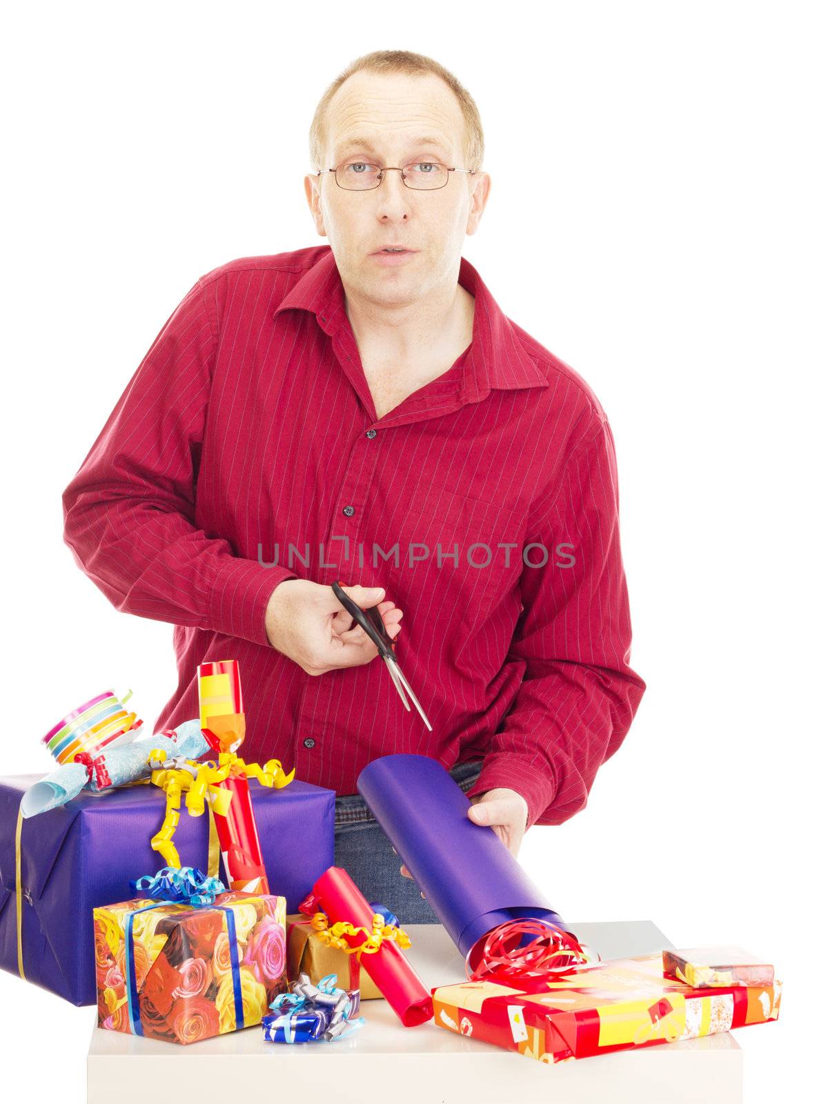 Person packaging some colorful gifts