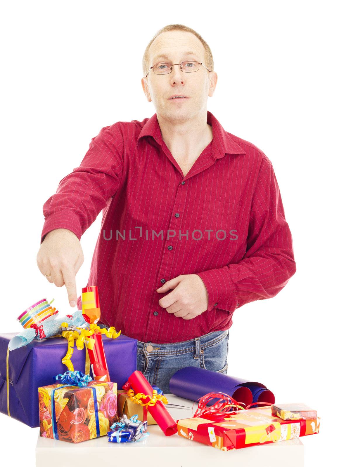 Person packaging some colorful gifts