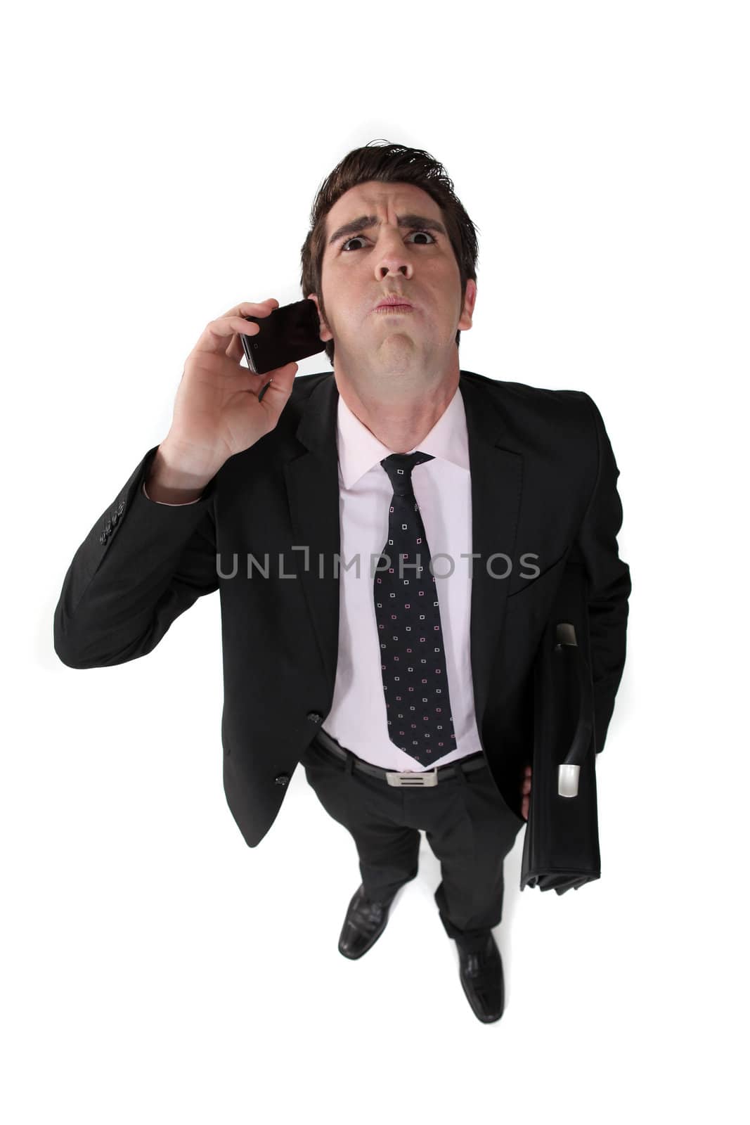 Businessman taking a bad phone call