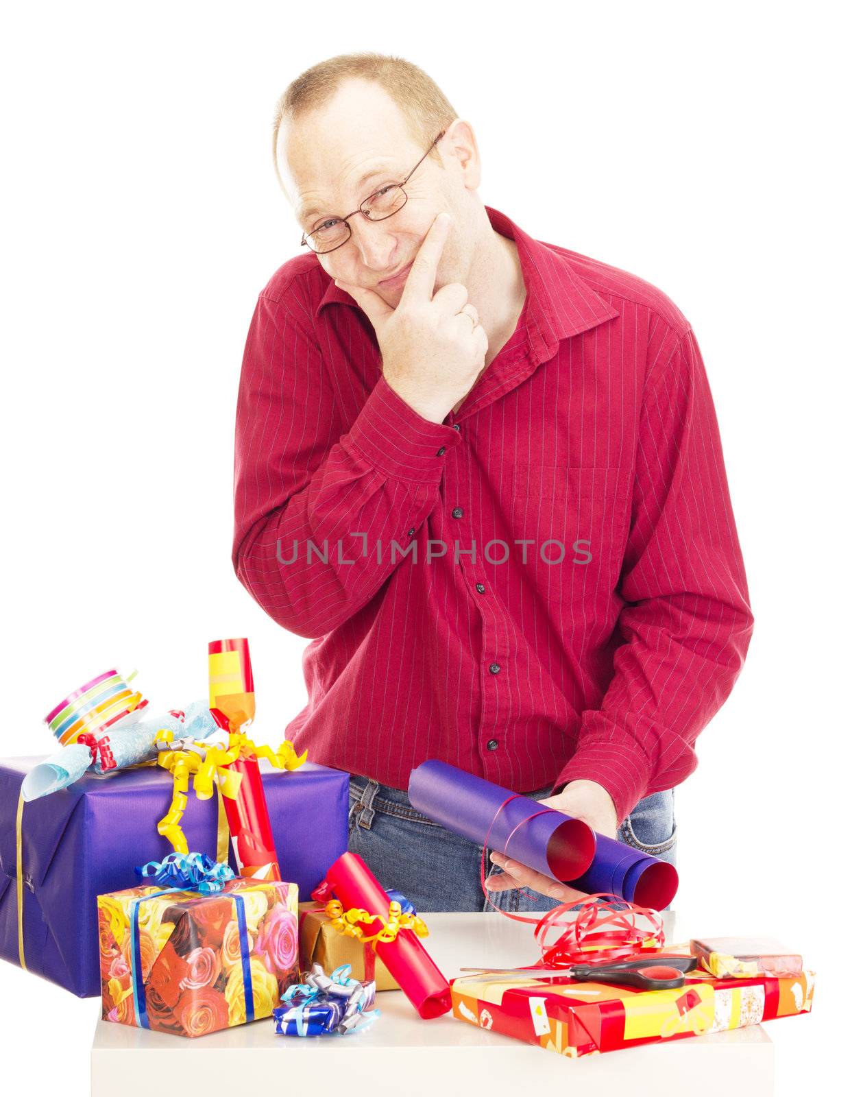 Person packaging some colorful gifts