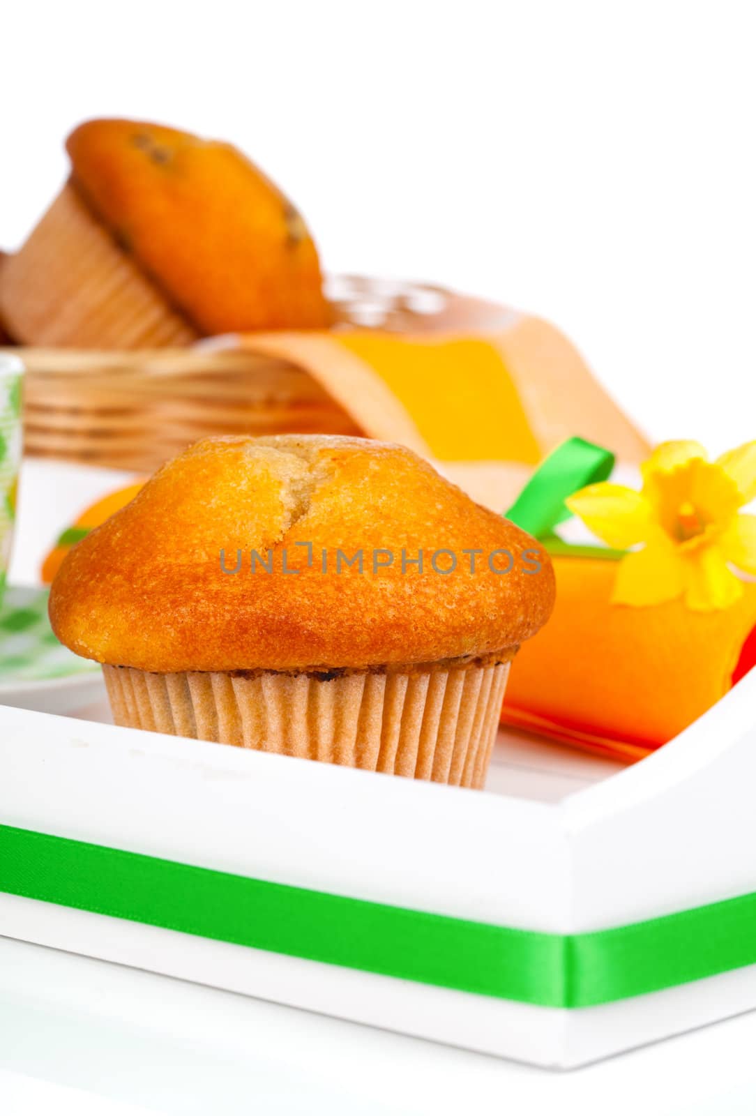 muffins in a tray for breakfast. isolated on white background. by motorolka