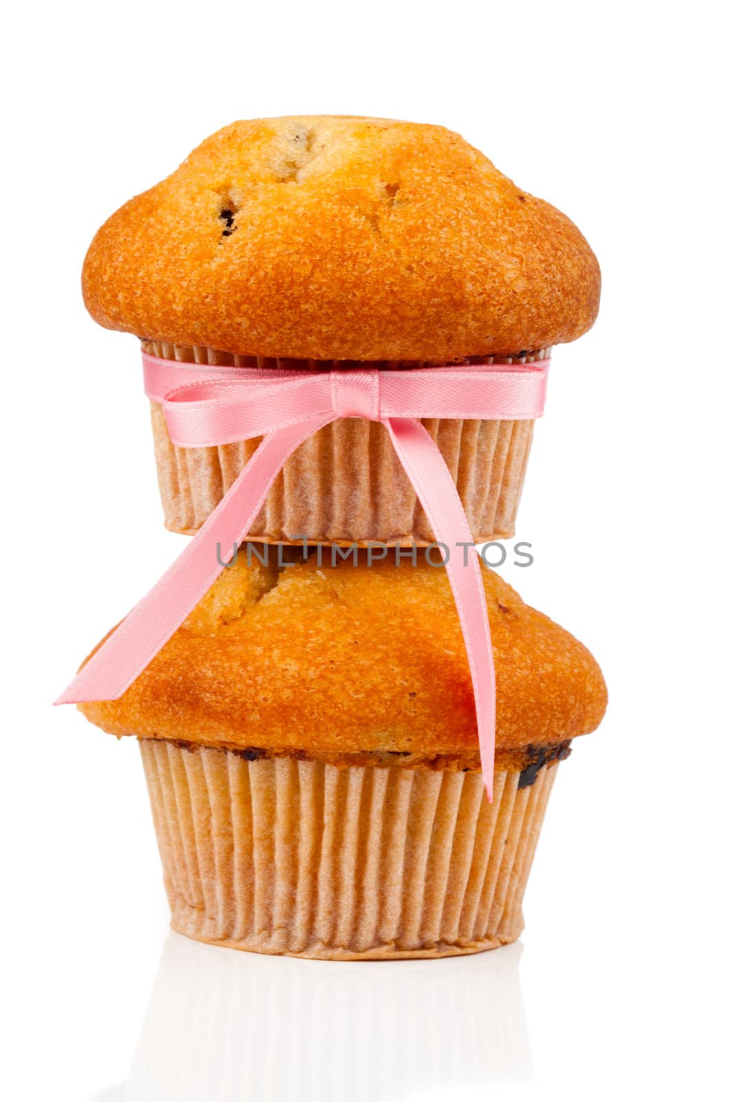muffins,  isolated on white background. by motorolka