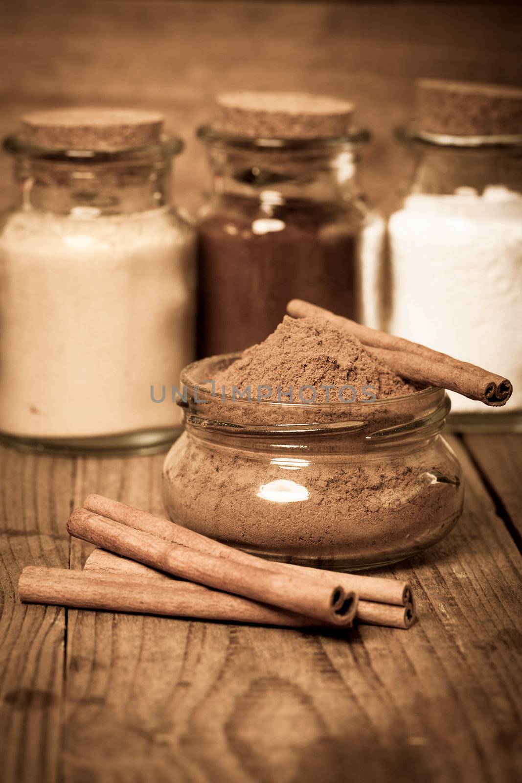 cinnamon, or chinese cinnamon in the transparent glass jar with  by motorolka