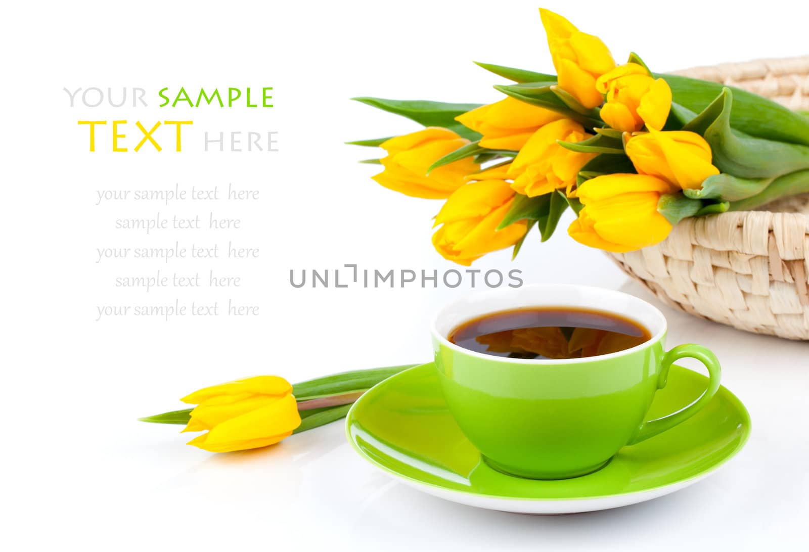 coffee cup with yellow tulips, on white background.