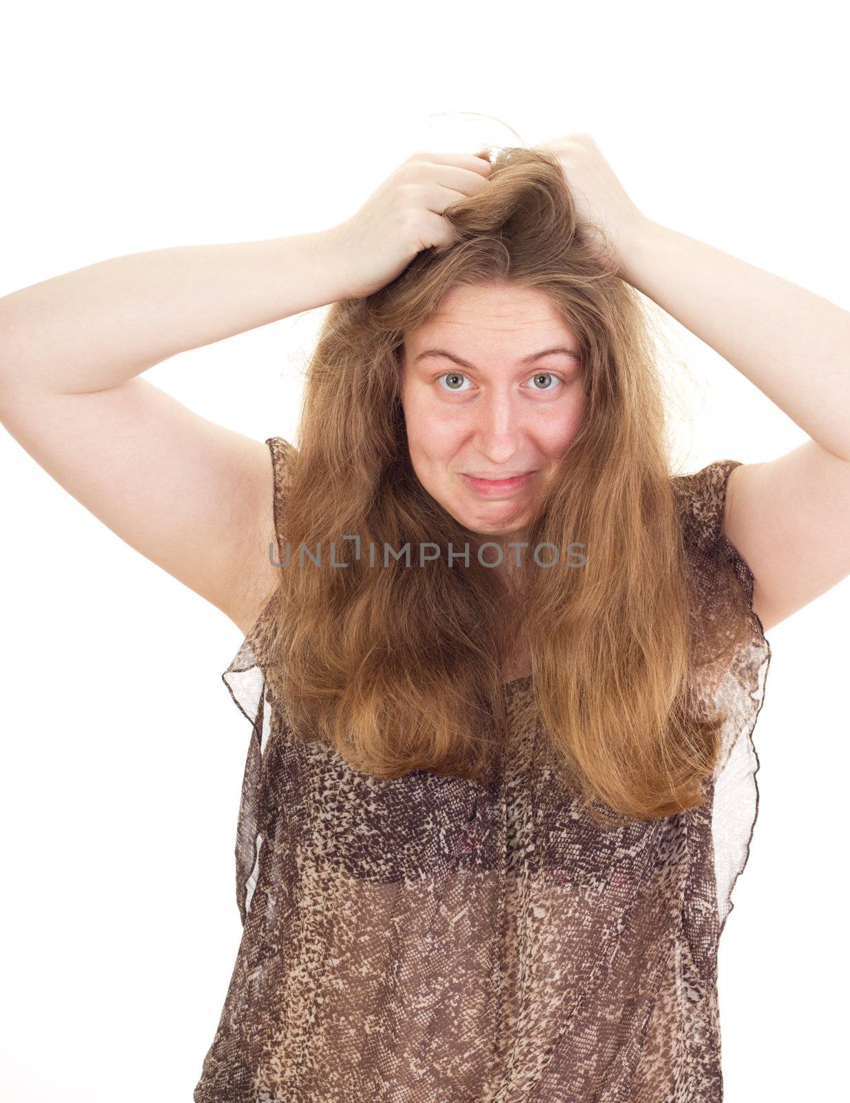 Young woman is tearing the hair