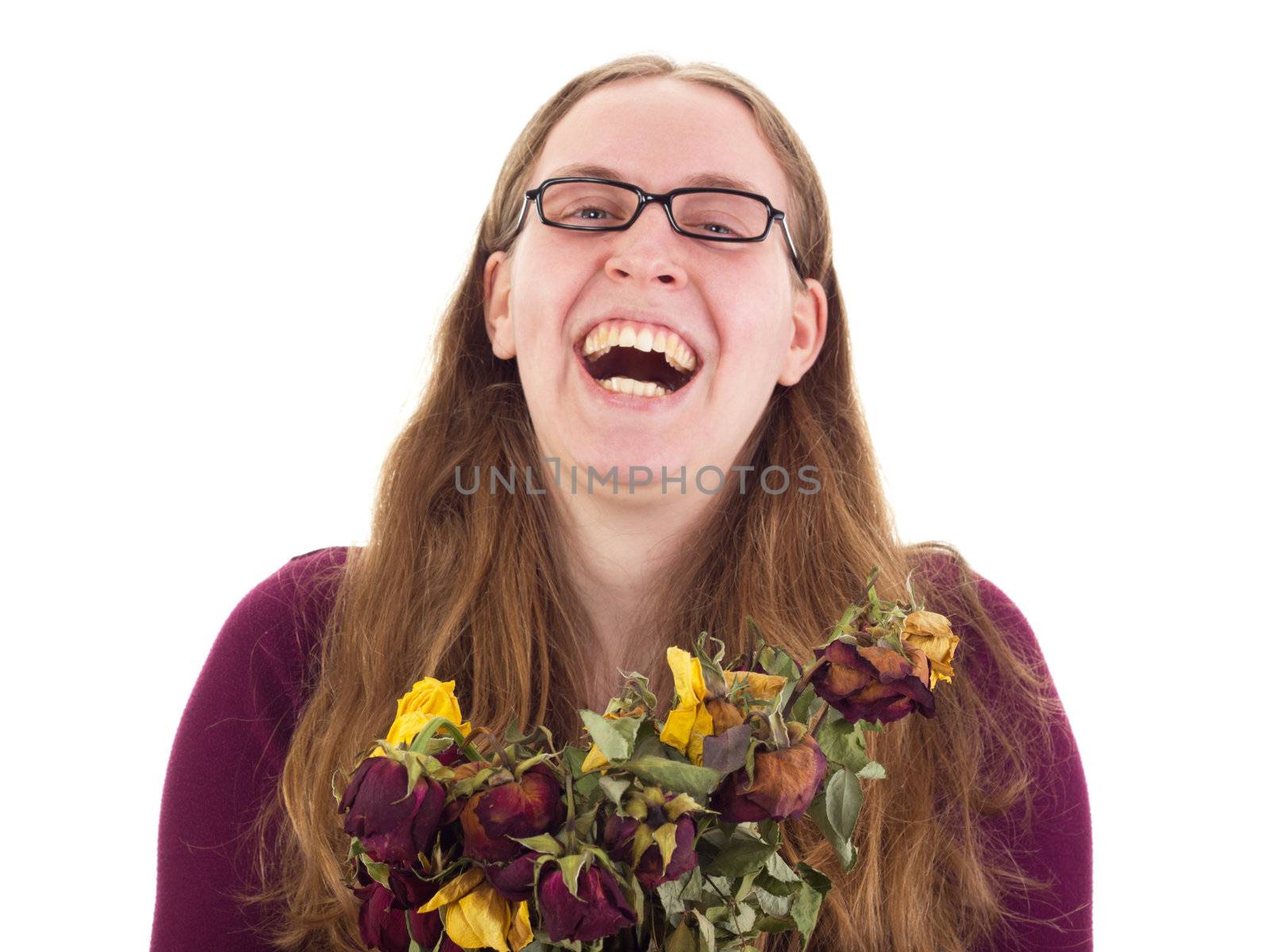 Woman laughing with dried roses