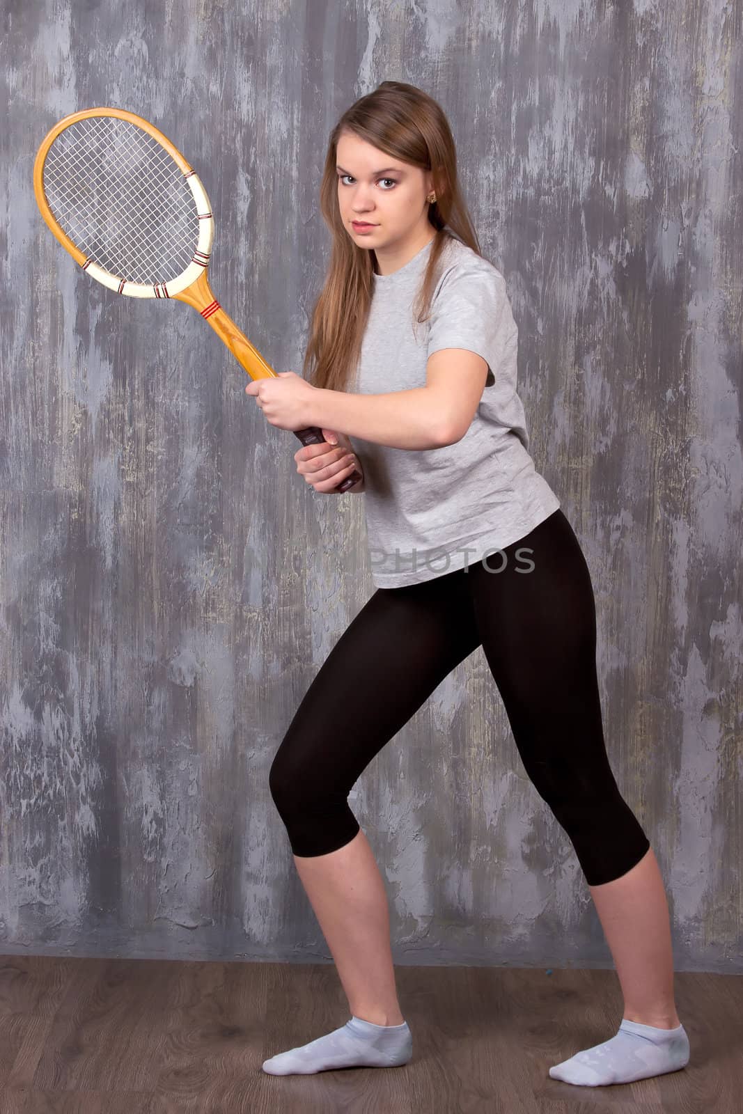  girl with tennis racket by victosha