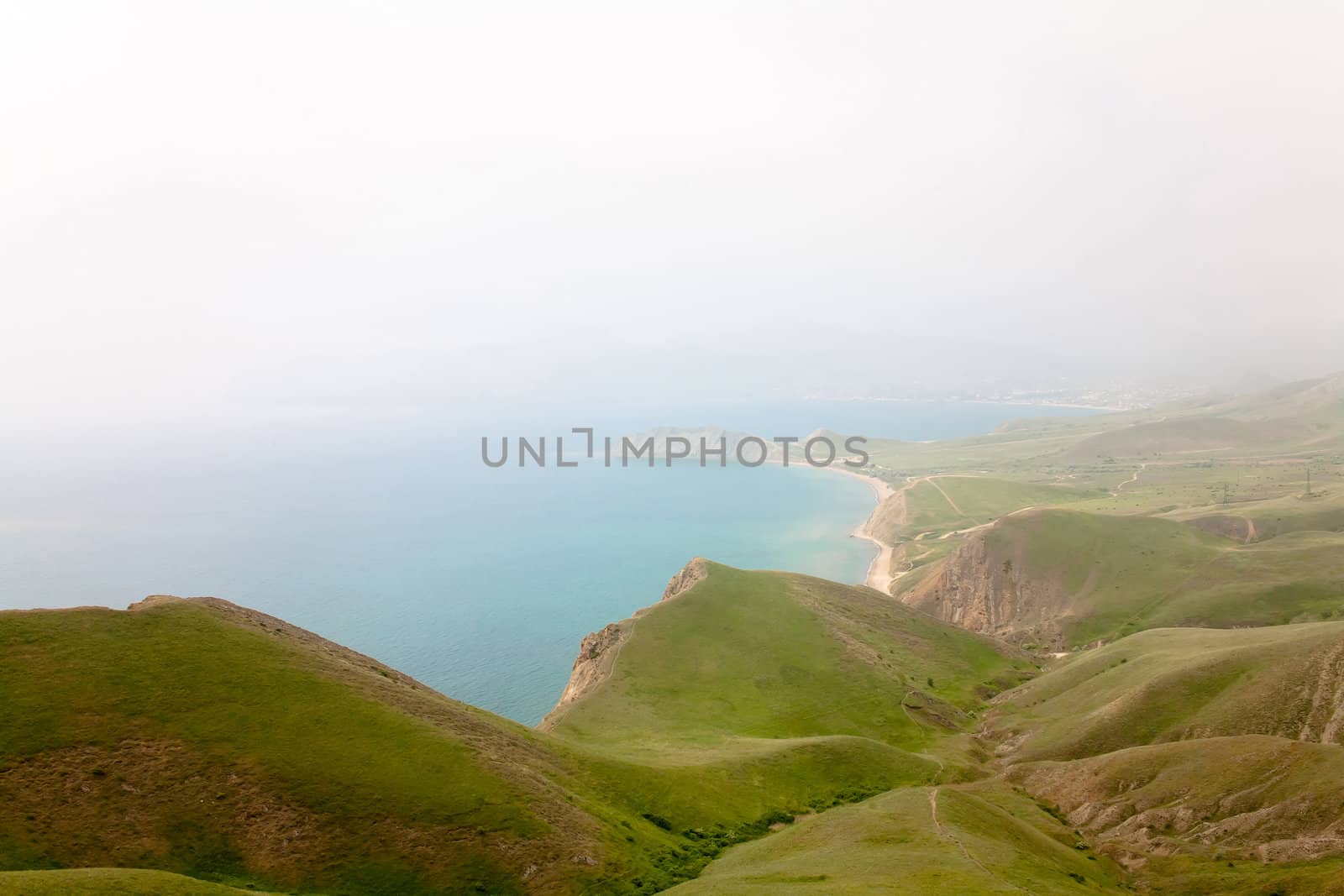 A summer landscape with sea and mountains
