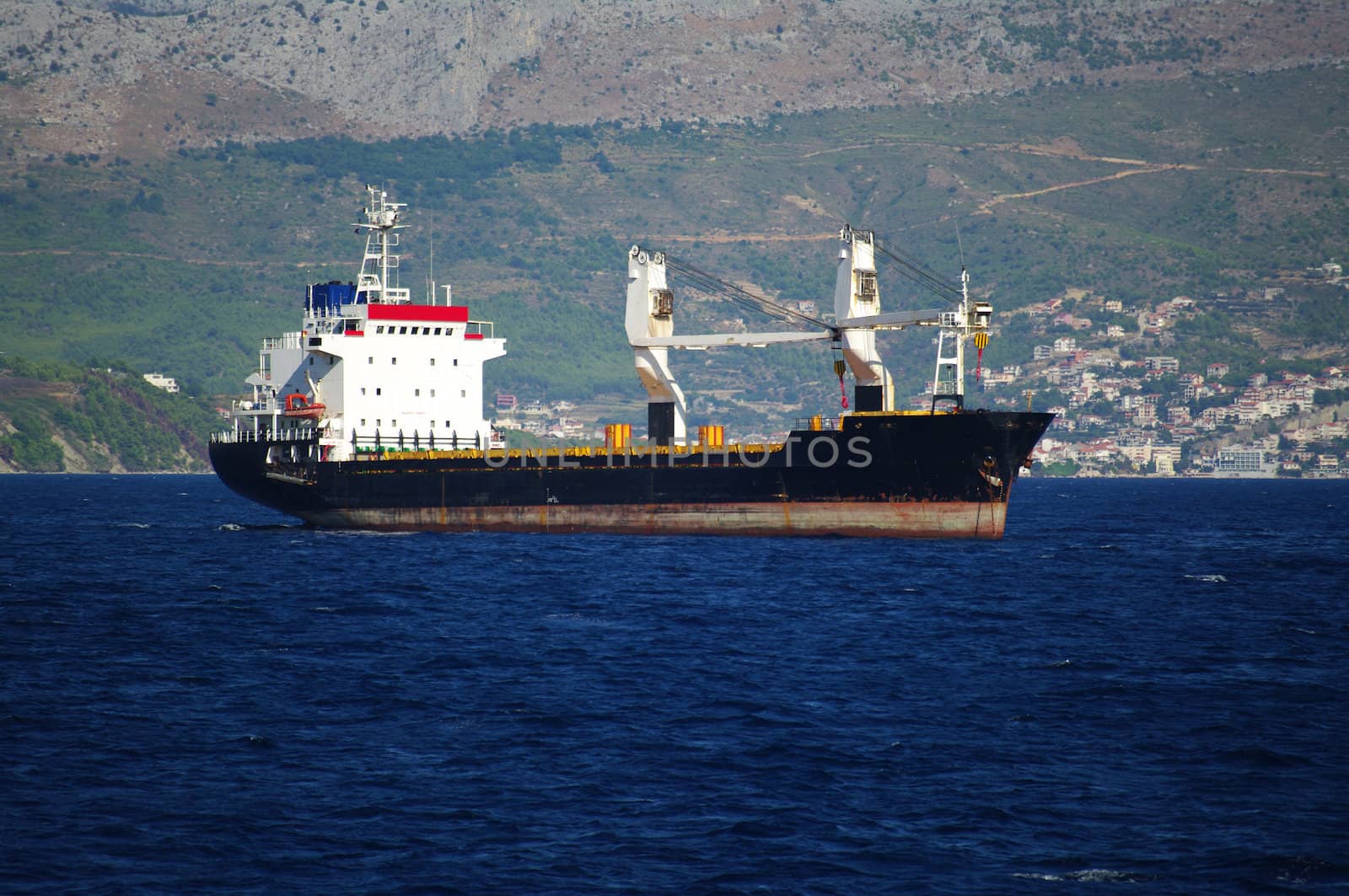Small cargo ship anchored in front of Split, Croatia