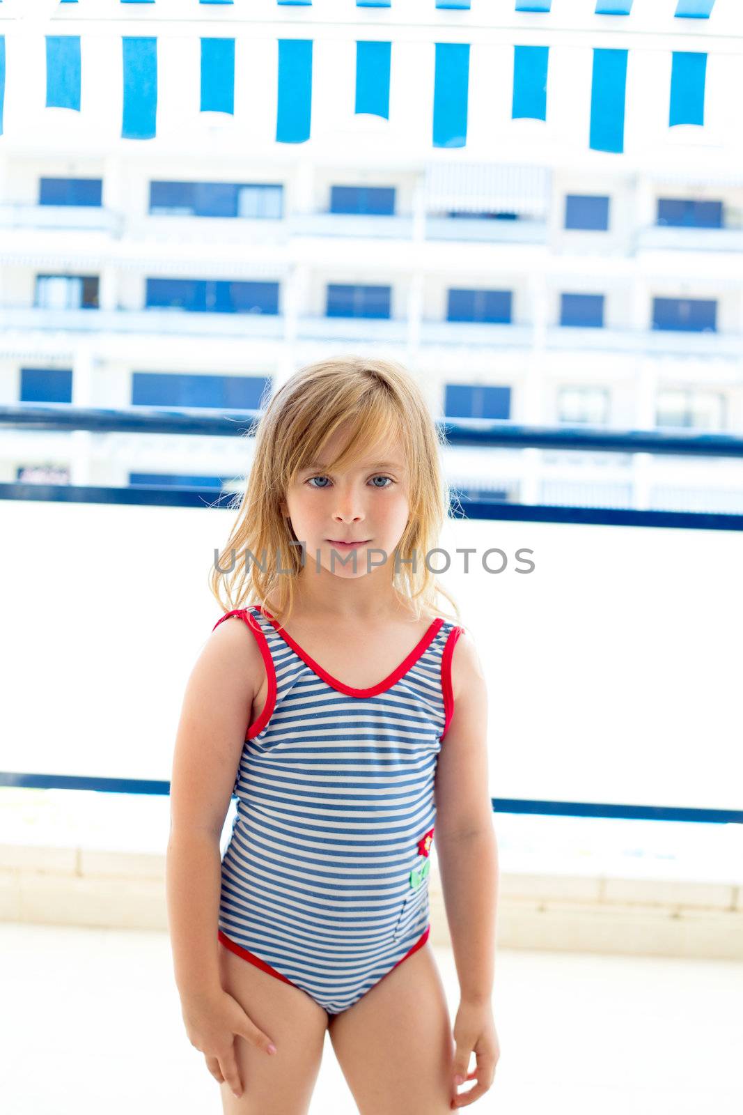 Blond kid girl with summer swimsuit by lunamarina