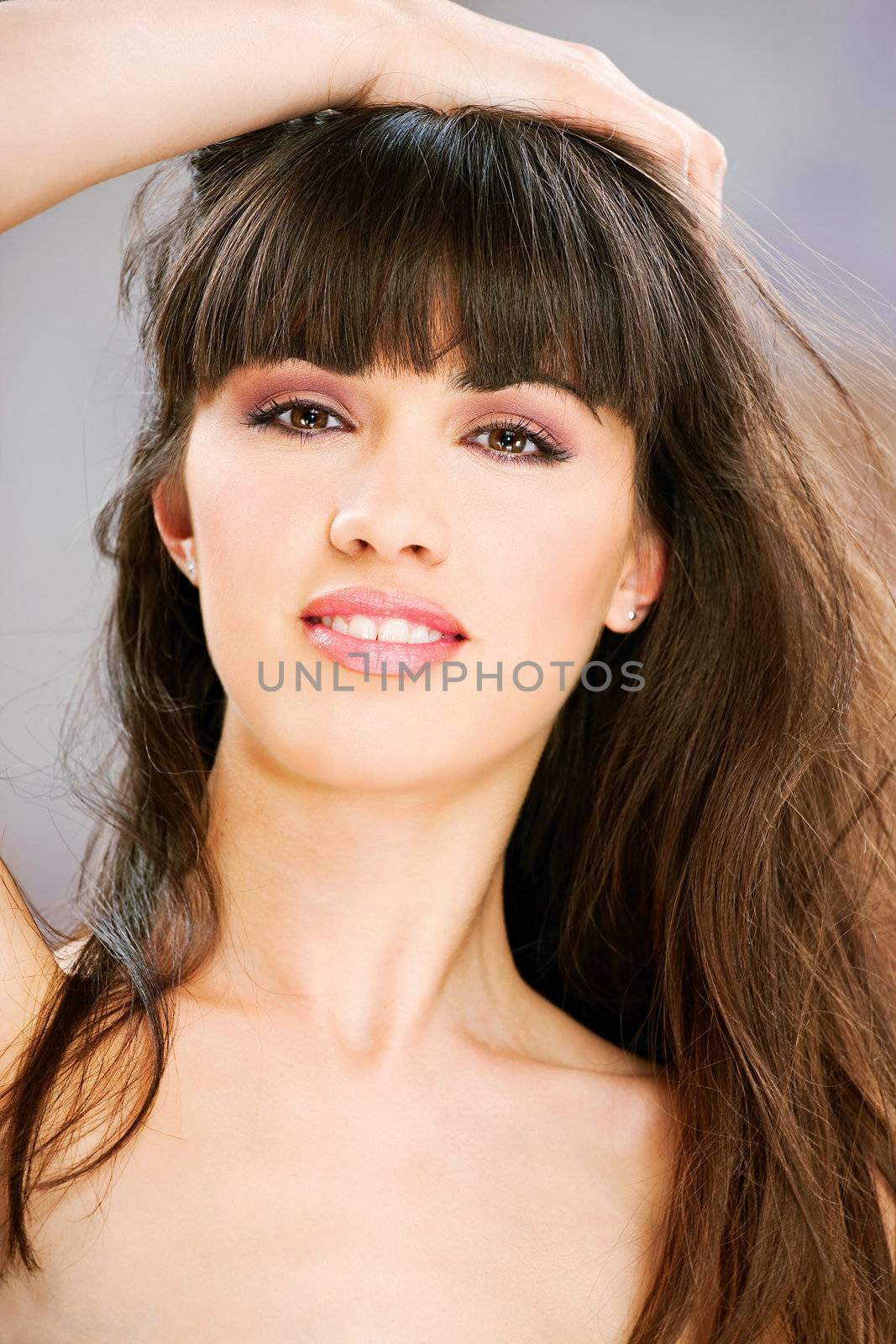 Pretty brunette woman with long hair