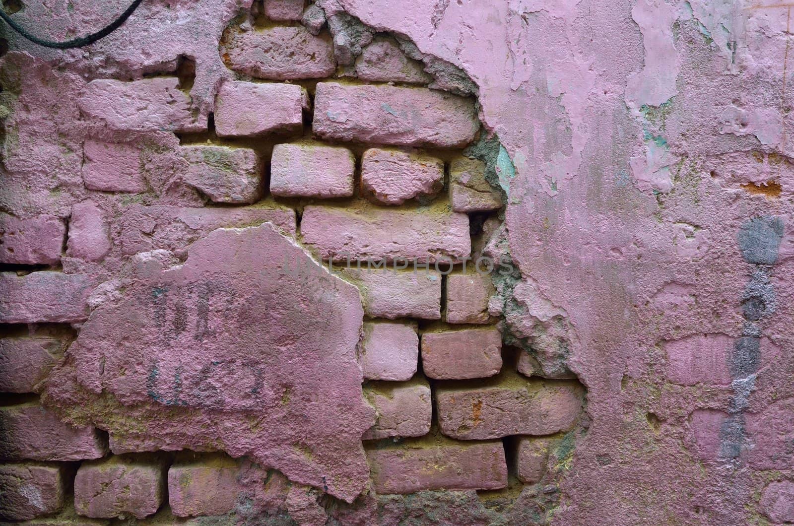 wall of concrete and red brick