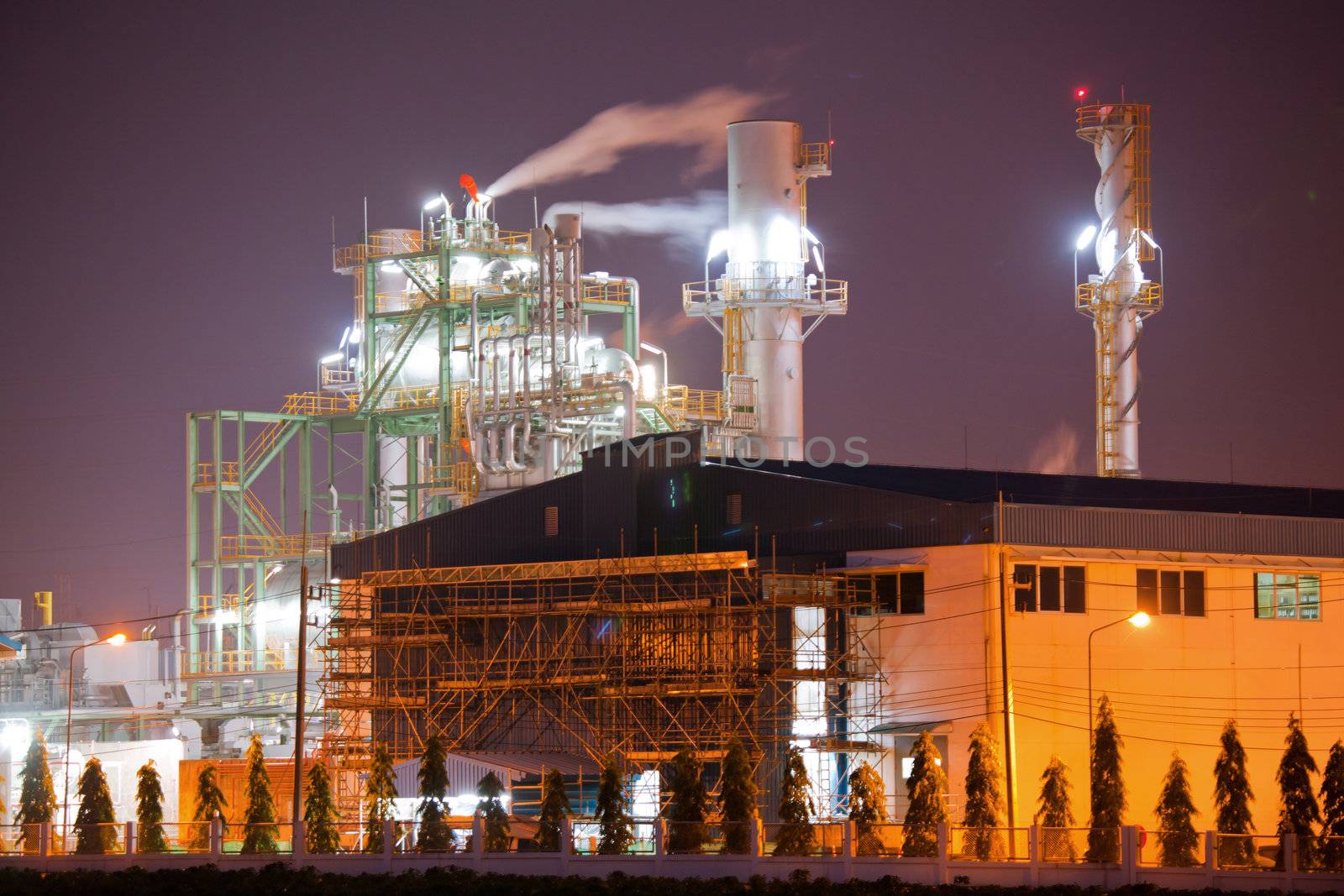 Architecture of Industry boiler in Oil Refinery Plant at night