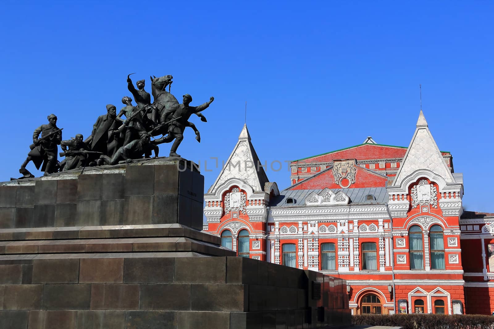 Town landscape with historic theater and blue sky