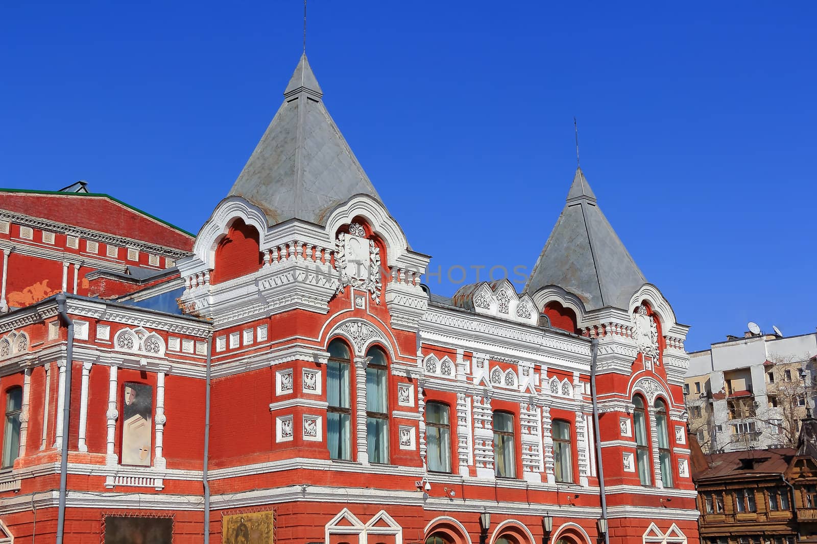 Town landscape with historic theater and blue sky