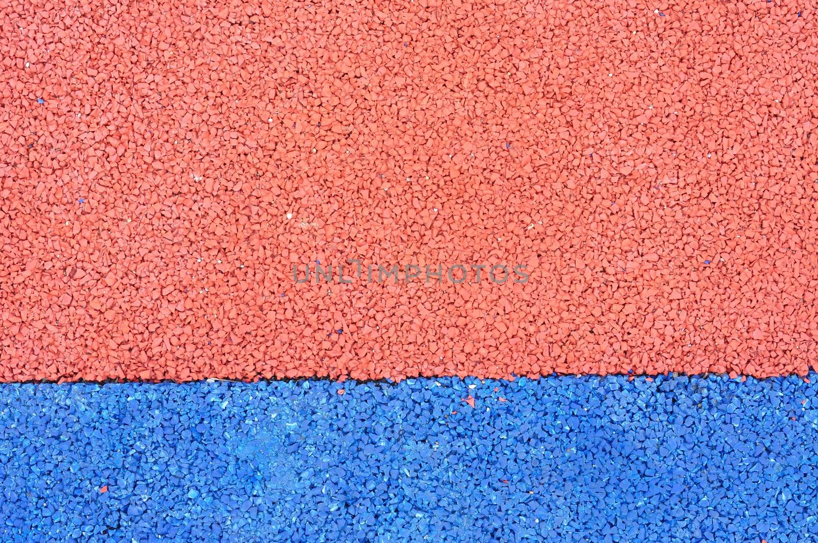 Texture of color rubber floor on playground. ( Ethylene Propylene Diene Monomeror EPDM)