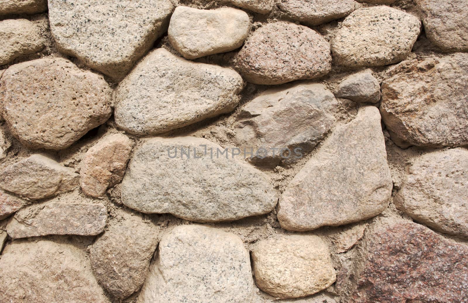 Texture of stone wall with various stones
