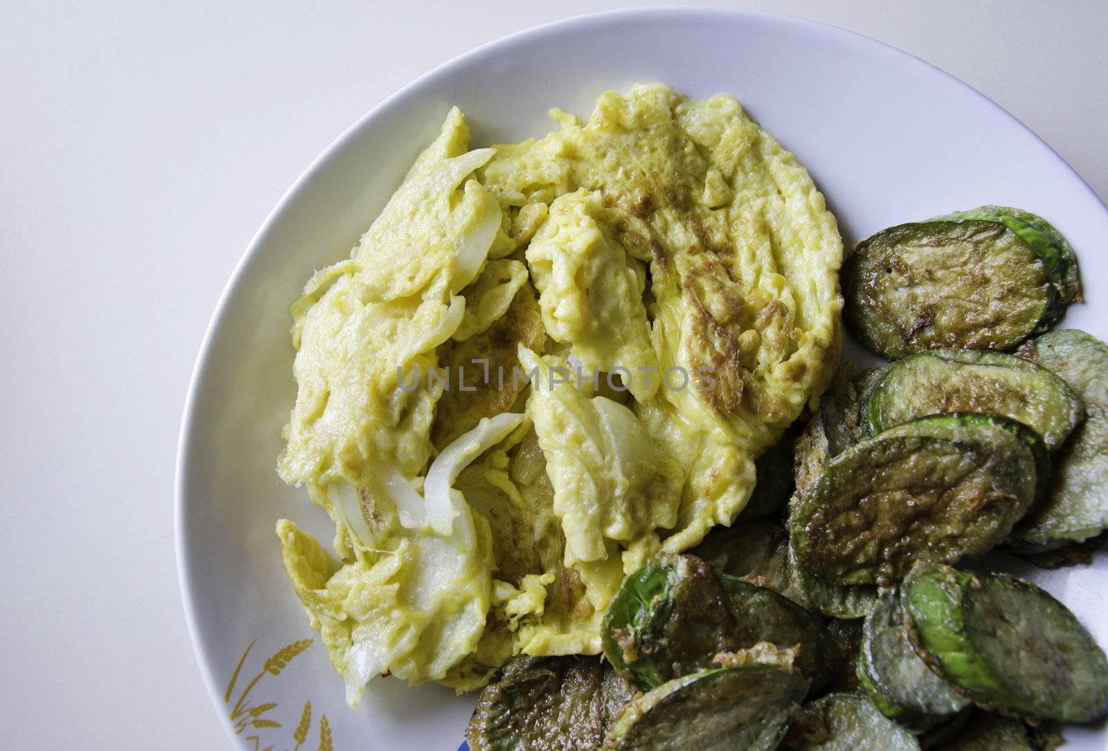 Omelet with fried eggplants vegetables