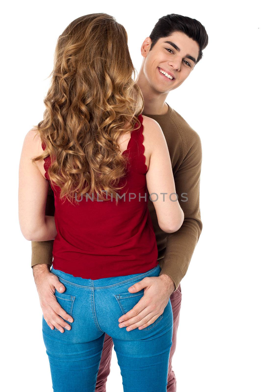 Young couple loving each other by stockyimages