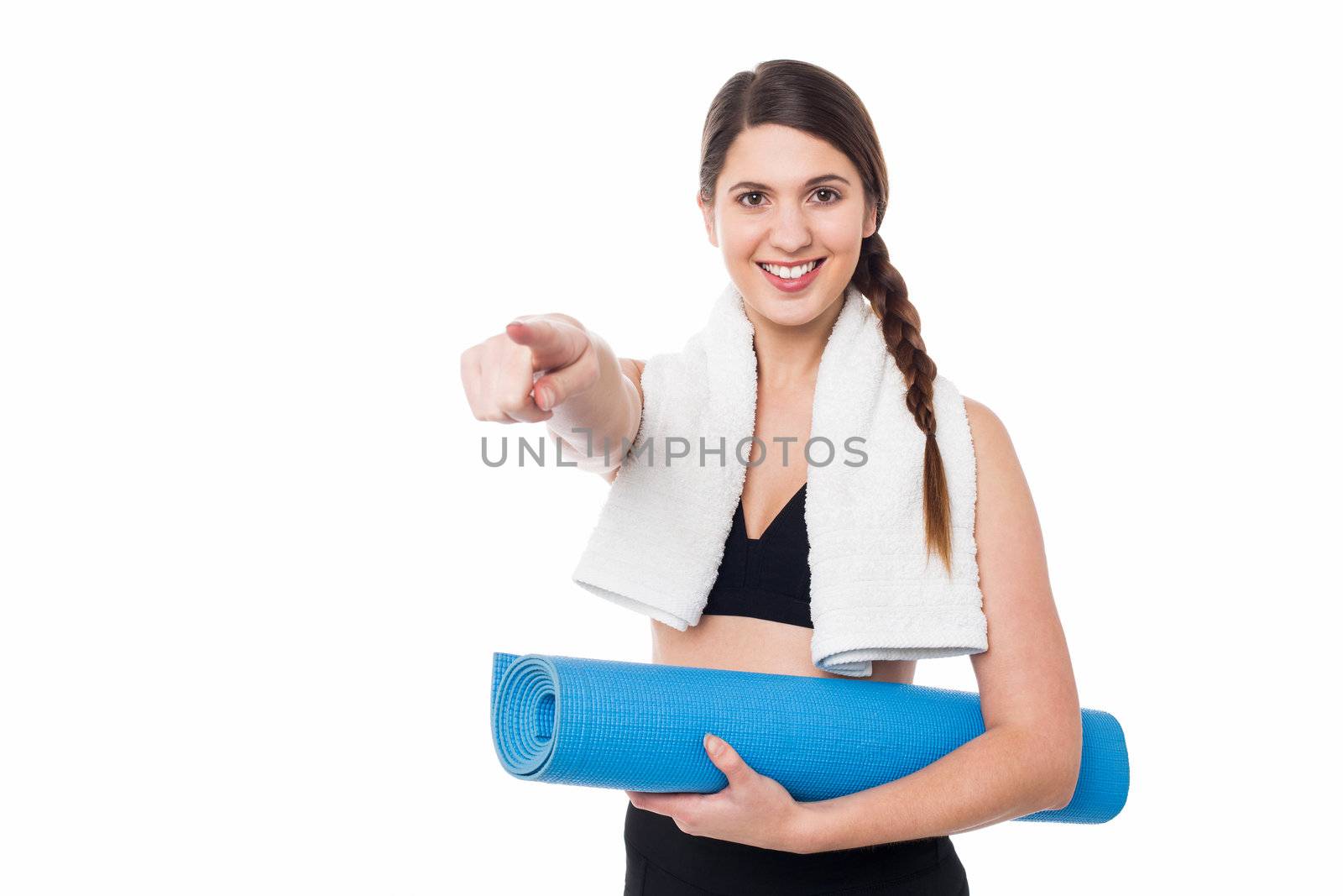 Fitness lady pointing you the direction by stockyimages