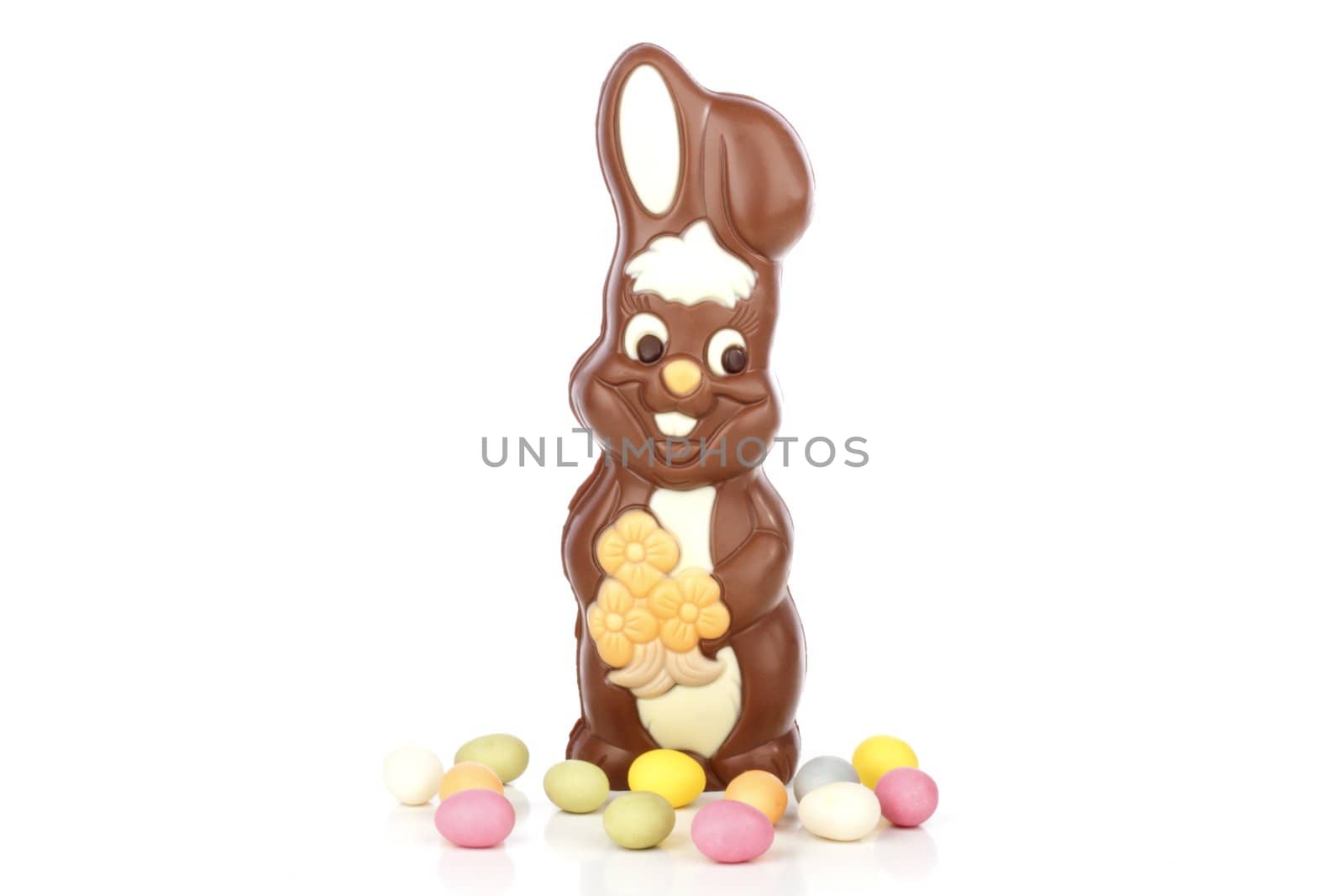 Chocolate easter bunny with colored eggs