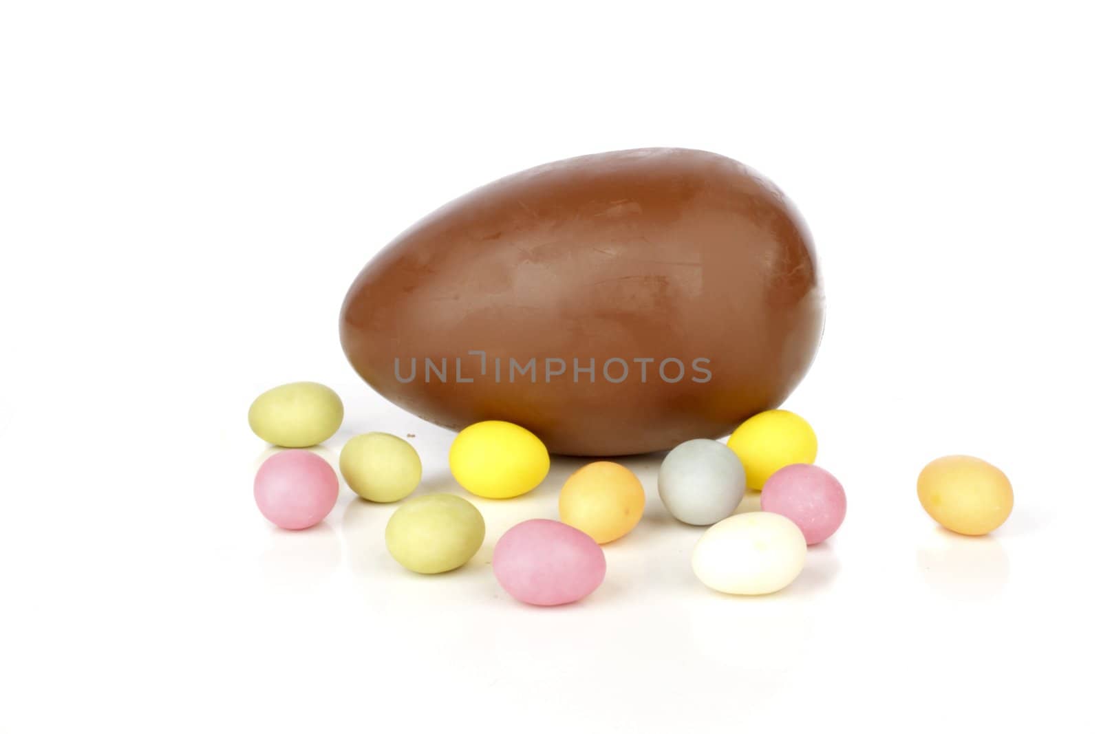 chocolate egg with little colored eggs