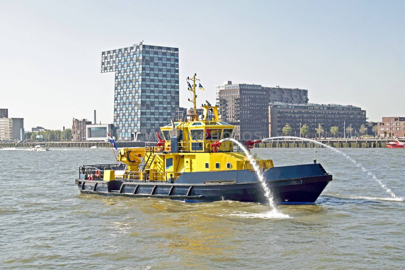 Fireboat in the harbor from Rotteram in the Netherlands