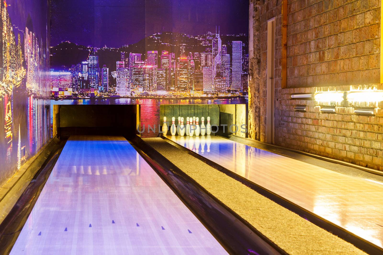 bowling alley with pins prepared for game
