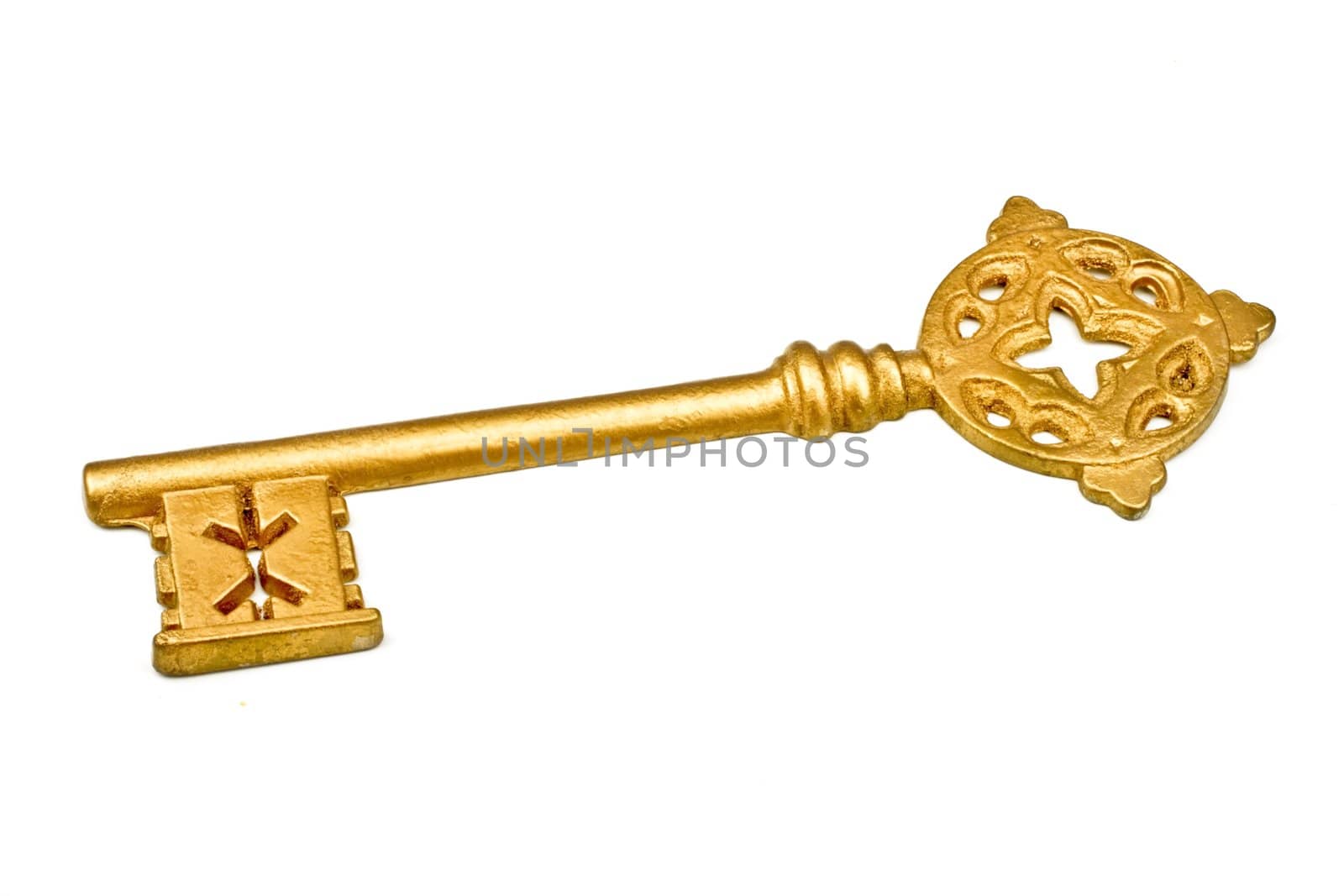 Golden key to success, isolated on the white background,