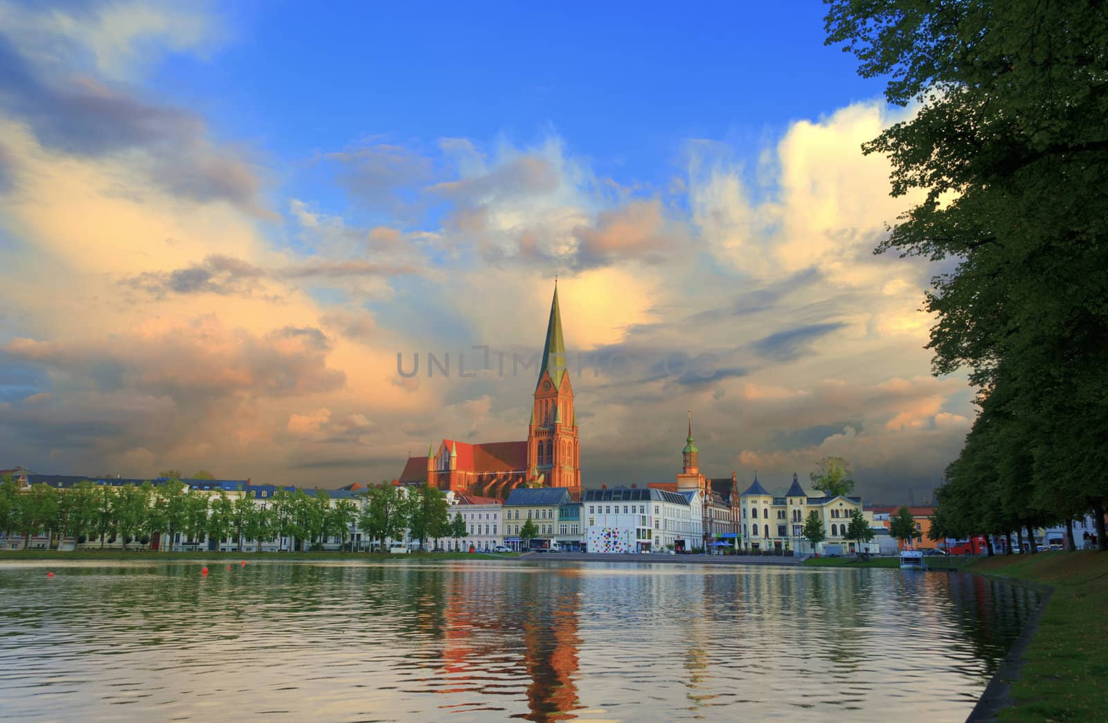 The Schwerin Cathedral behind the Pfaffenteich. HDR image, very vibrant colors.