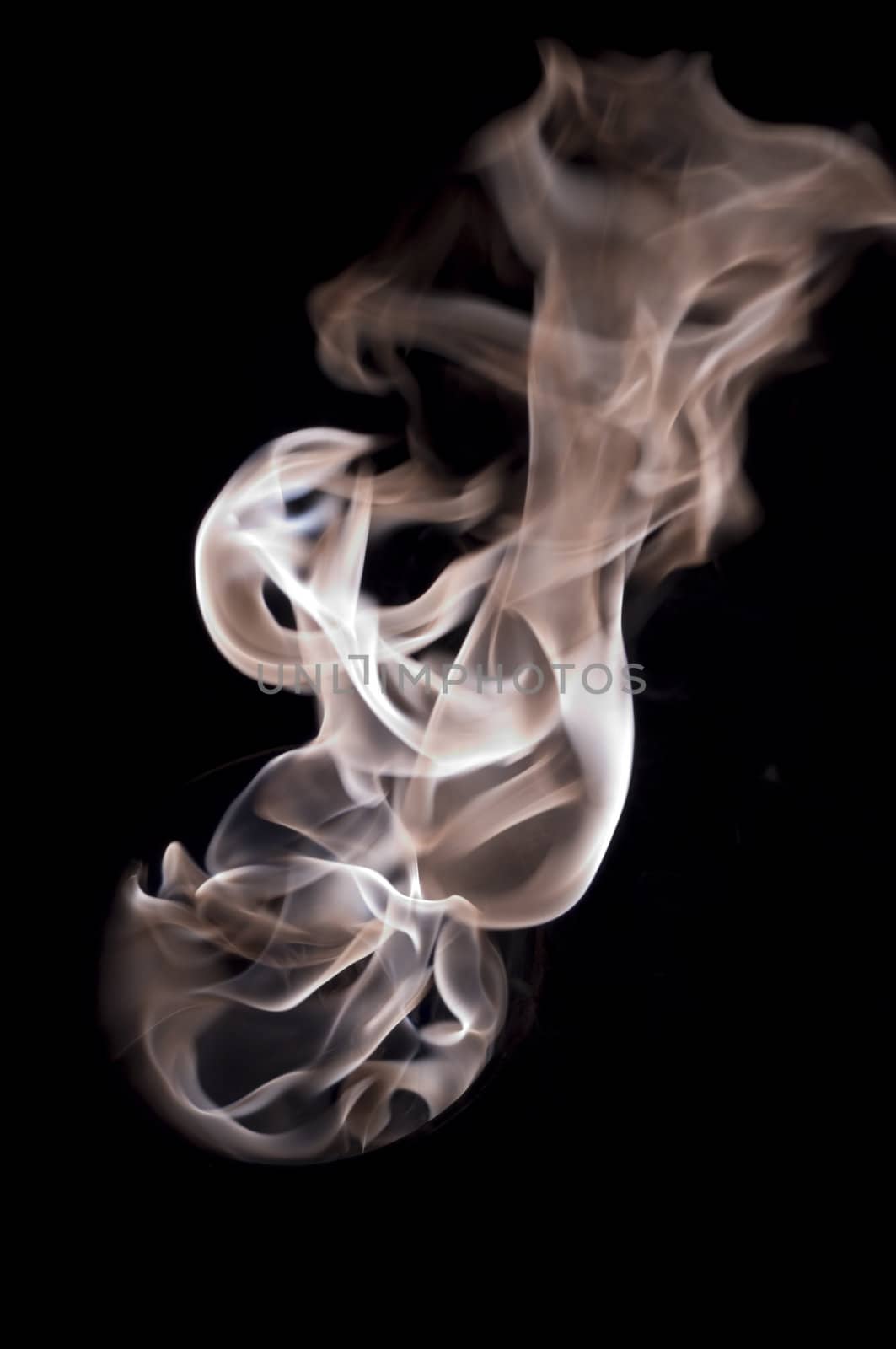 white fire with a black background, abstract background.
