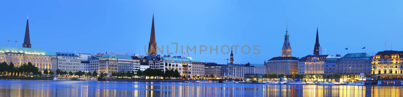 Panorama picture of the Binnenalster in Hamburg at the blue hour.