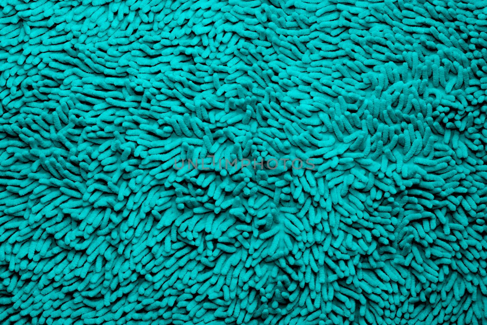 Cyan Microfiber bath mat in the background