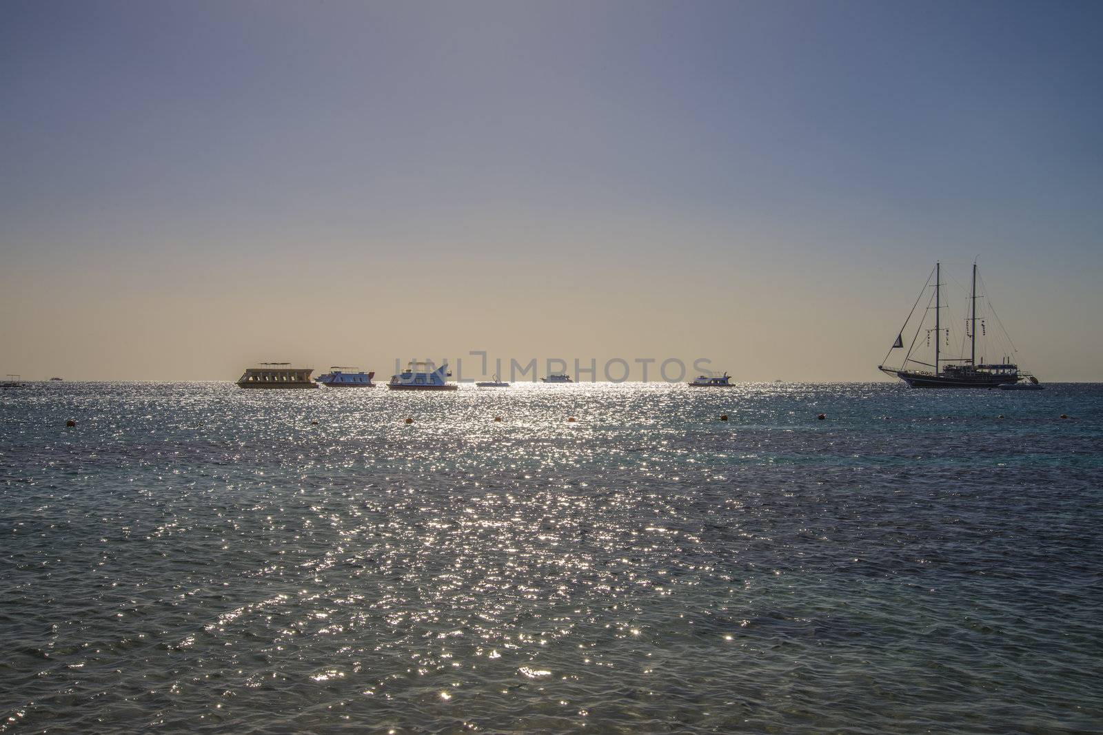 if you shall vacation in naama bay, sharm el sheikh, egypt so take a trip with one of the glass boats, the trip takes about an hour and it is an amazing sight when the boat is sailing over coral reefs in the bay.