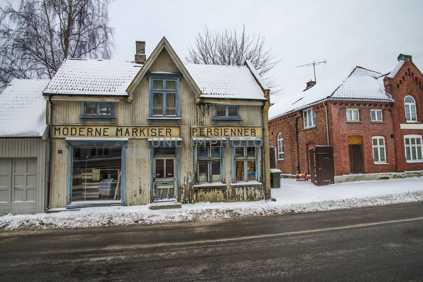 old business house in Halden that sells awnings, blinds, roller shutters, etc. the picture is shot in december 2012.