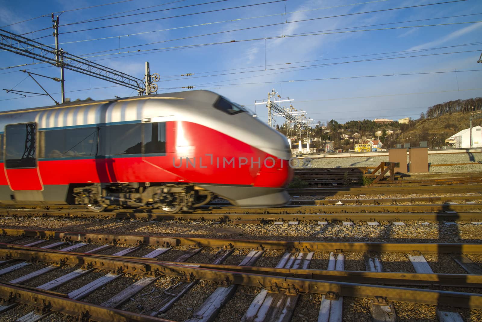 train at full speed on their way from Halden railway station to Oslo main railway station